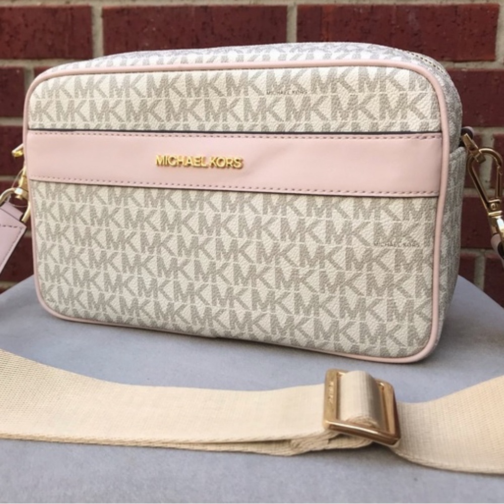 Pink and White with Gold accents Michael Kors Crossbody bag Used Condition